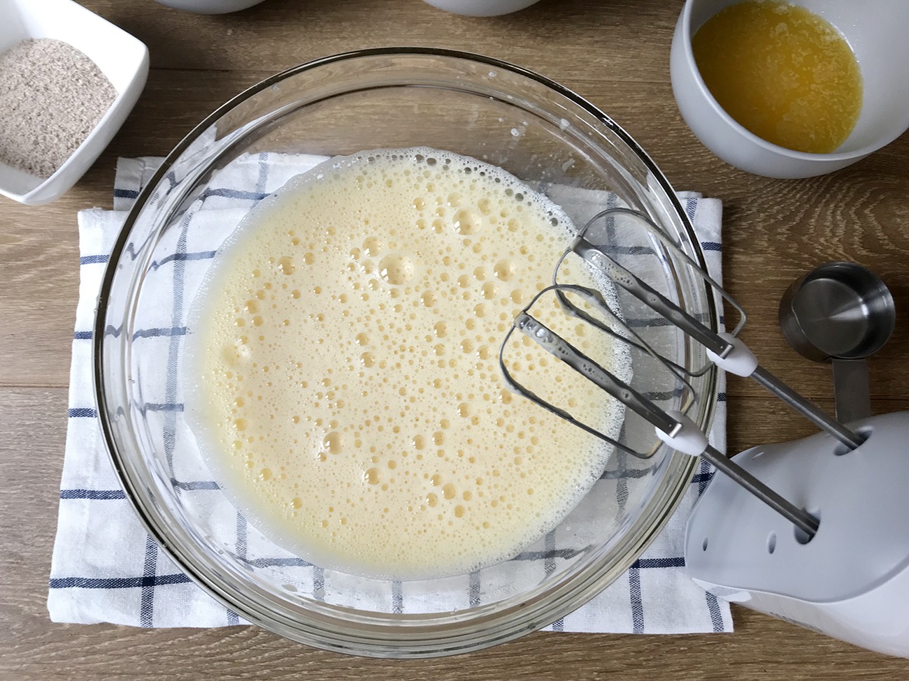 Whisk the eggs using the hand mixer until fluffy.