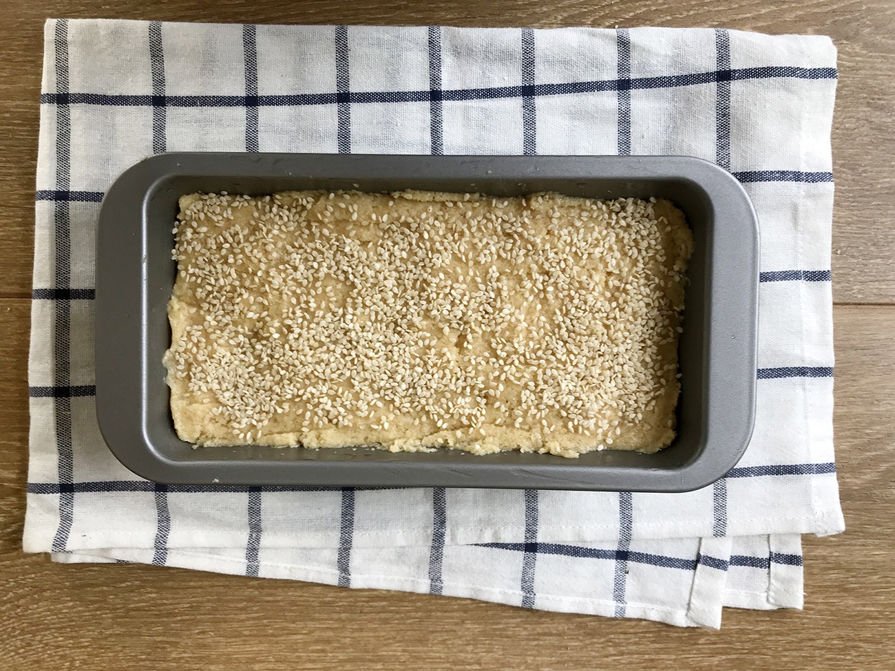 top the loaf with sesame seeds