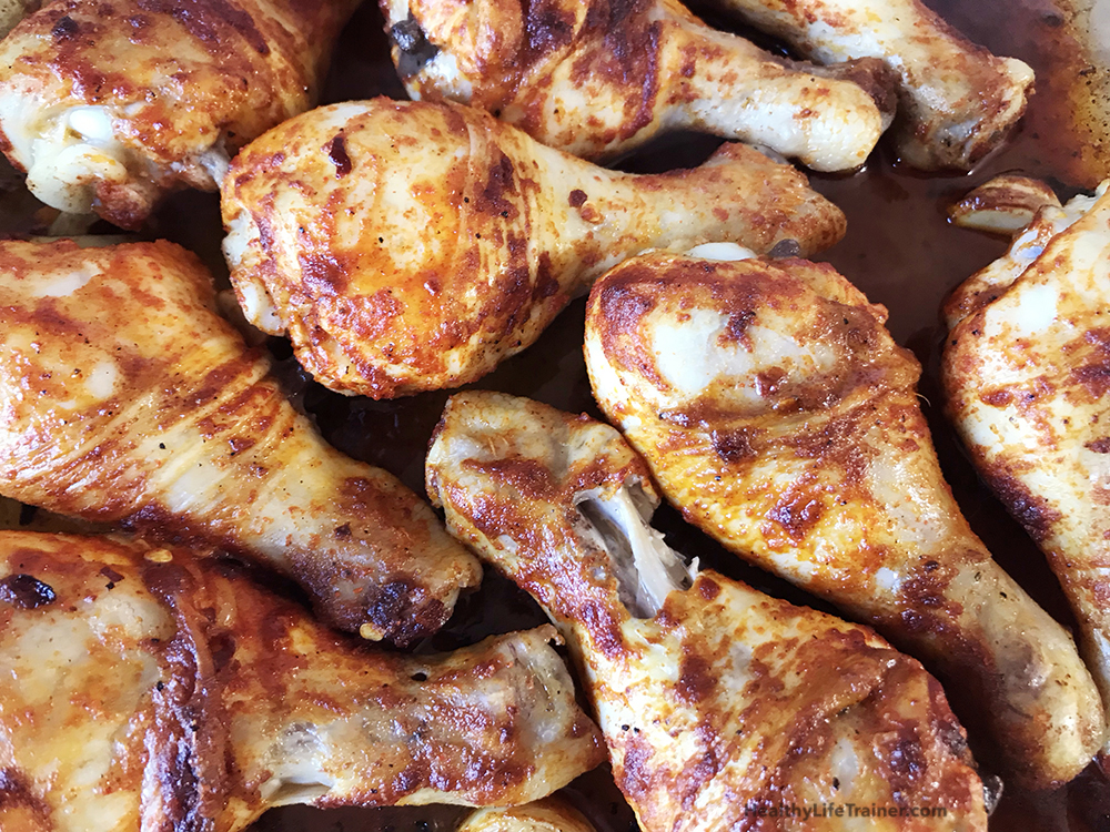 Baked Paprika Chicken Drumsticks in a baking pan.