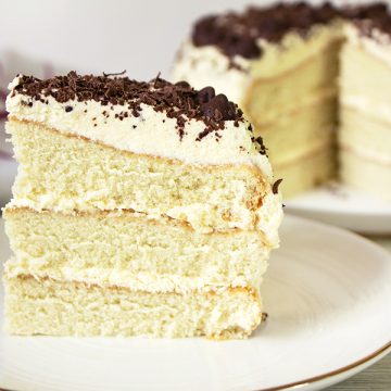 Easy Vanilla Cake – Three layers of fluffy sponge cake made from scratch