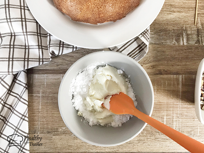 making the cream cheese frosting.