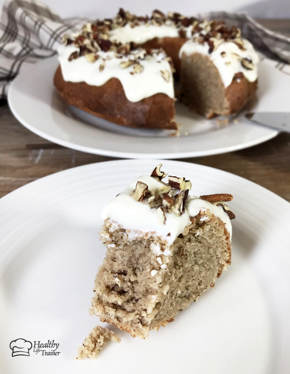 a slice of the keto Peanut Butter Cake With Cream Cheese Frosting