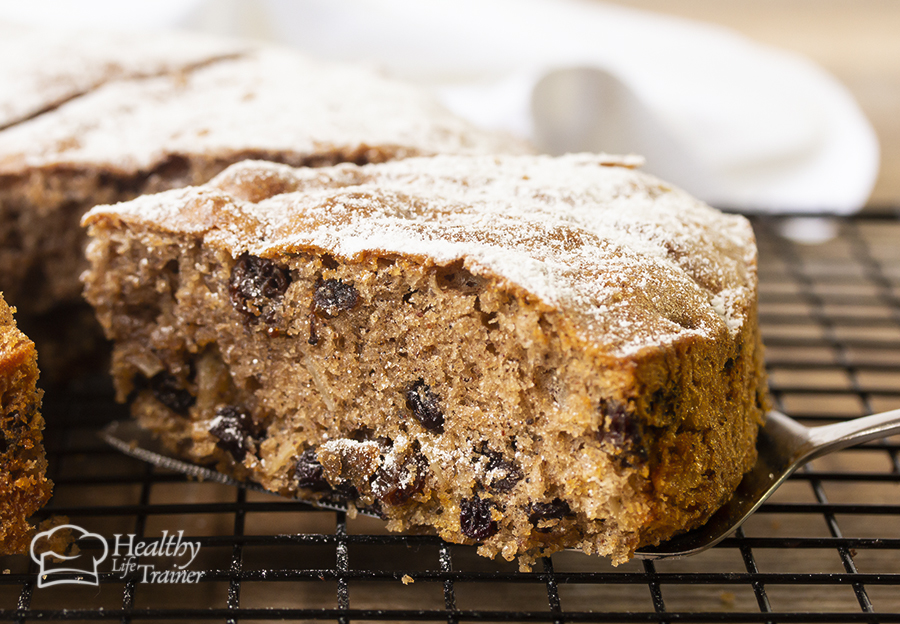 dried fruit cake topped with icing sugar