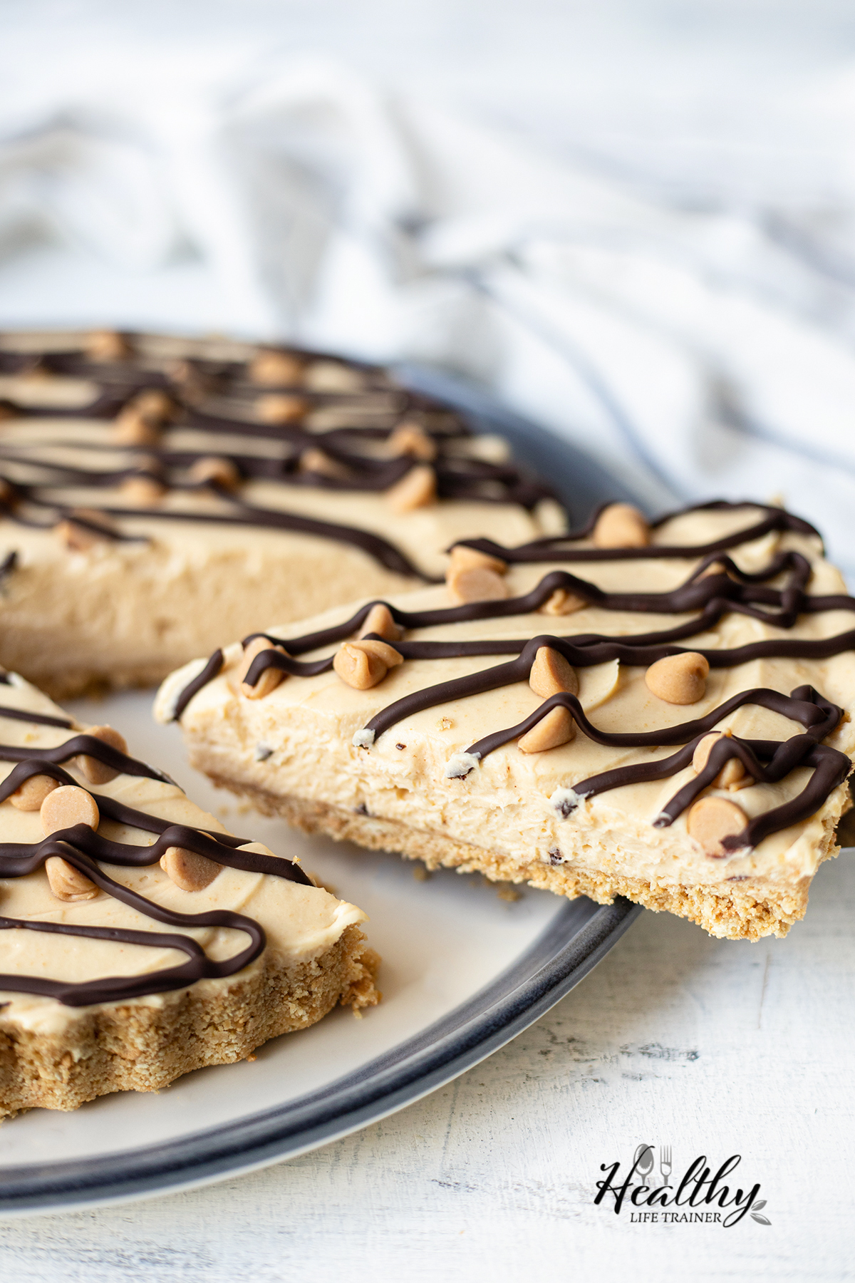 Classic Peanut Butter Pie topped with Reese's peanut butter chips and chocolate.