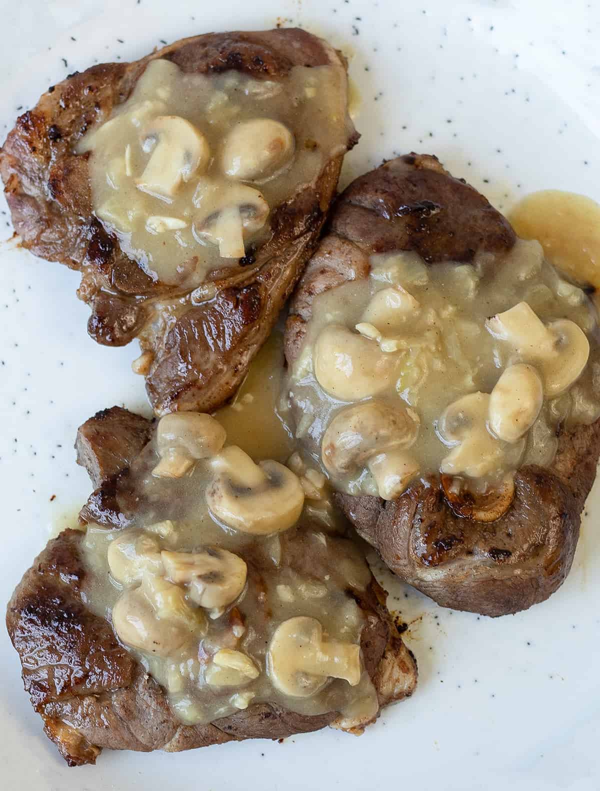 three  juicy Sirloin steaks topped with Mushroom Gravy.