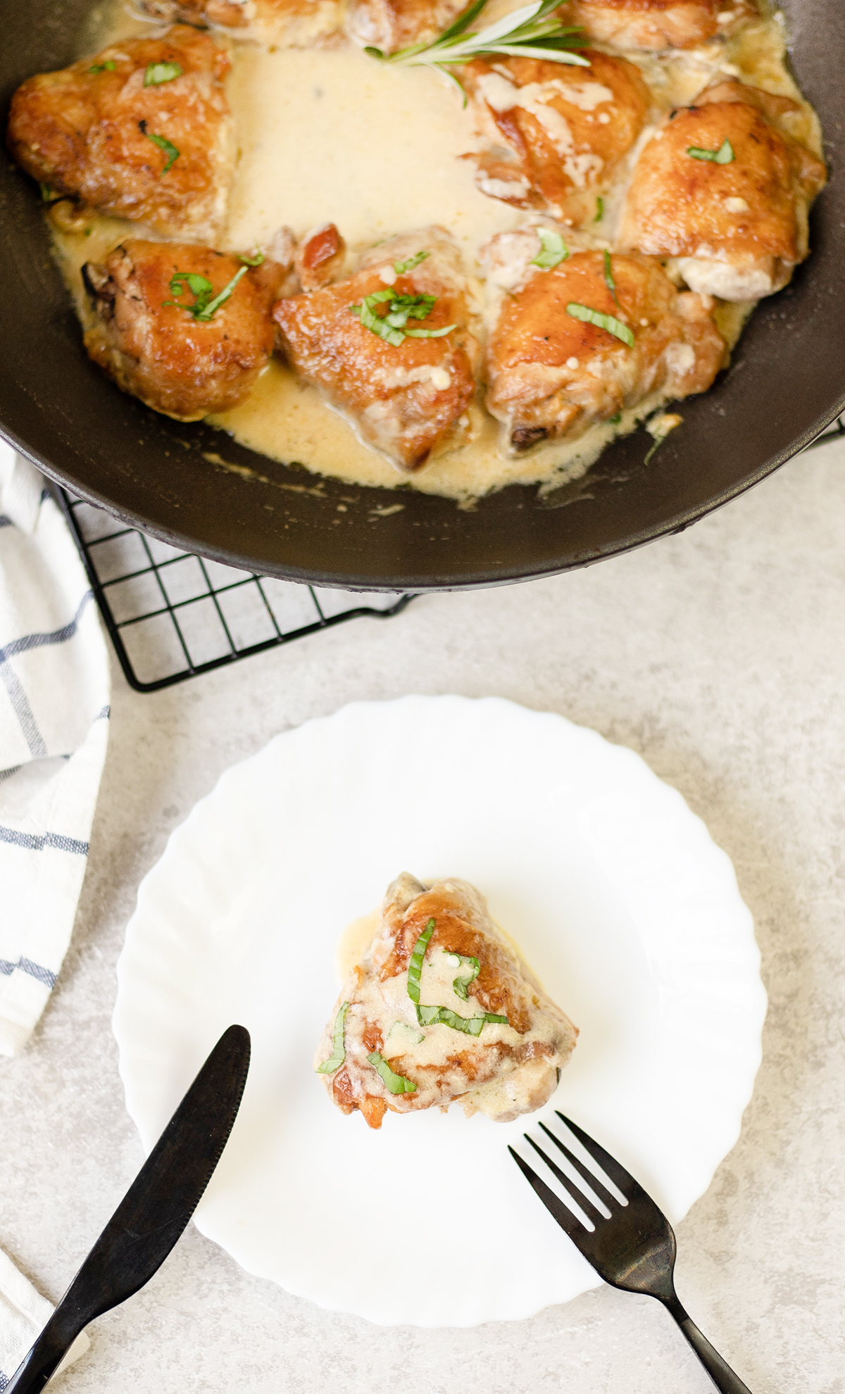 Creamy garlic chicken thigh in a plate