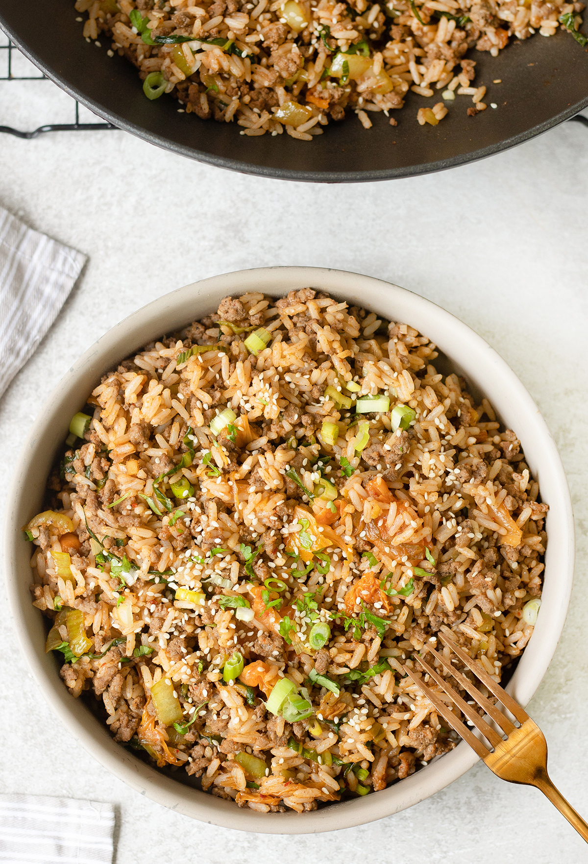 Transfer to a bowl and garnish with spring onion.