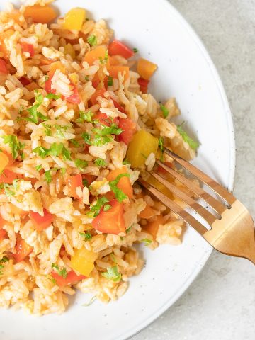 Egg And Vegetable Fried Rice in a serving plate.