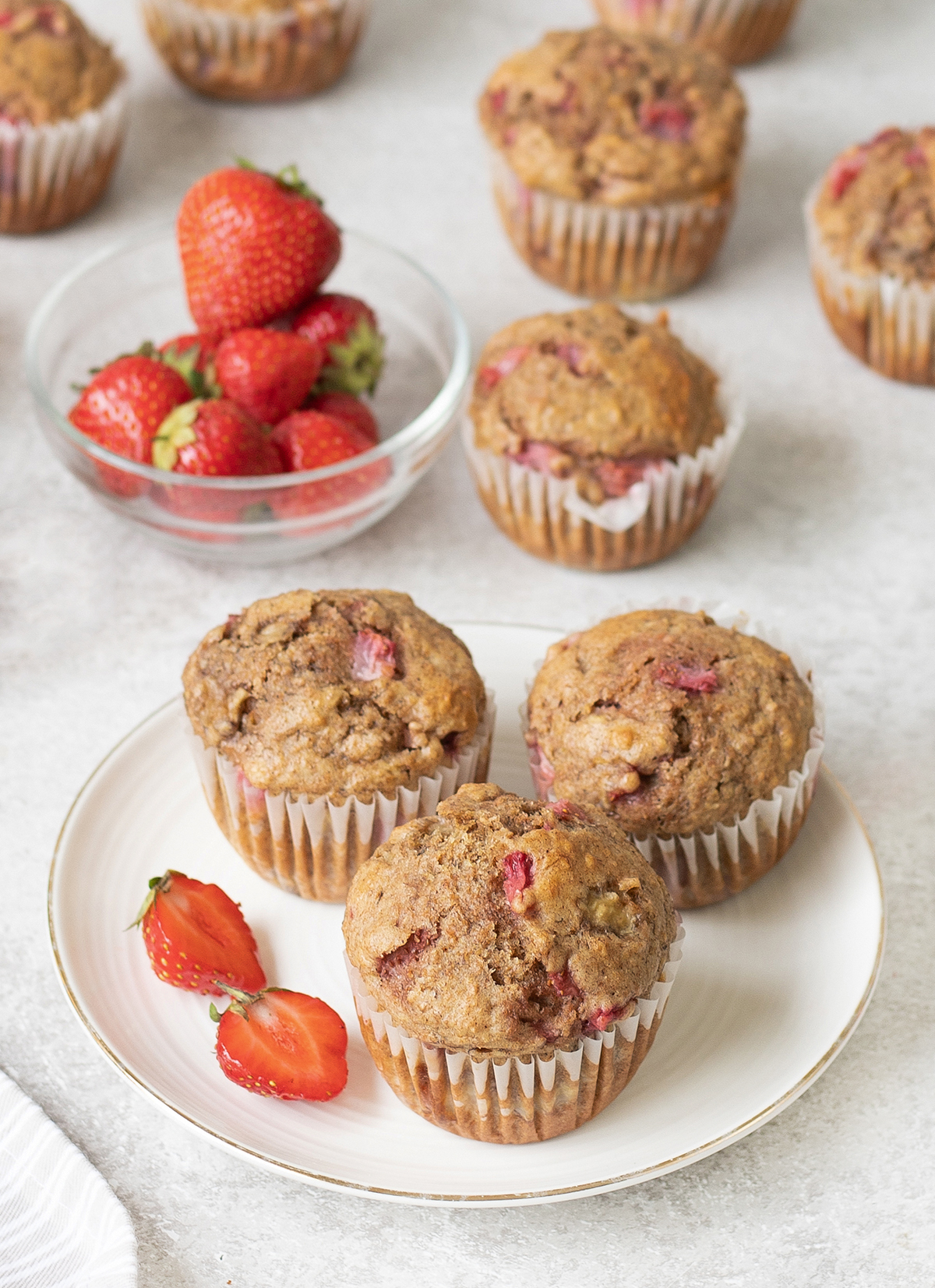 Whole Wheat Strawberry Banana Muffins in a serving pllate.