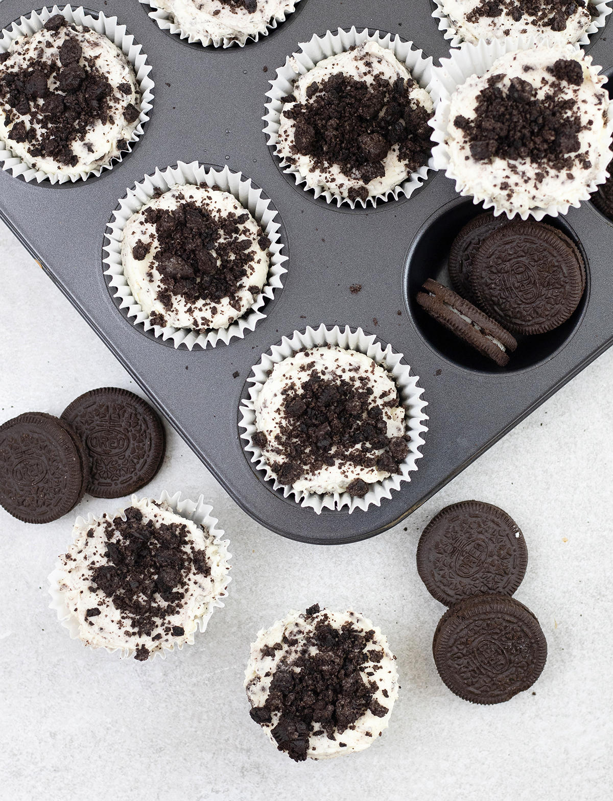 Oreo Cheesecake Bites in a muffin tin