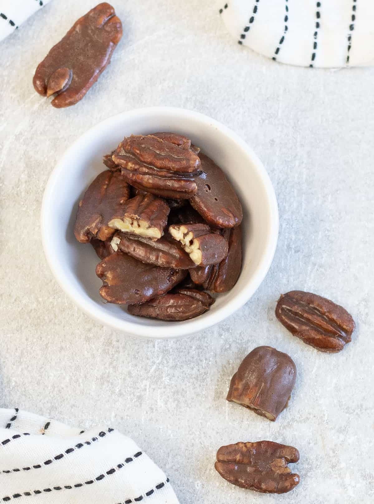 Chocolate Covered Pecans in a small bowl.