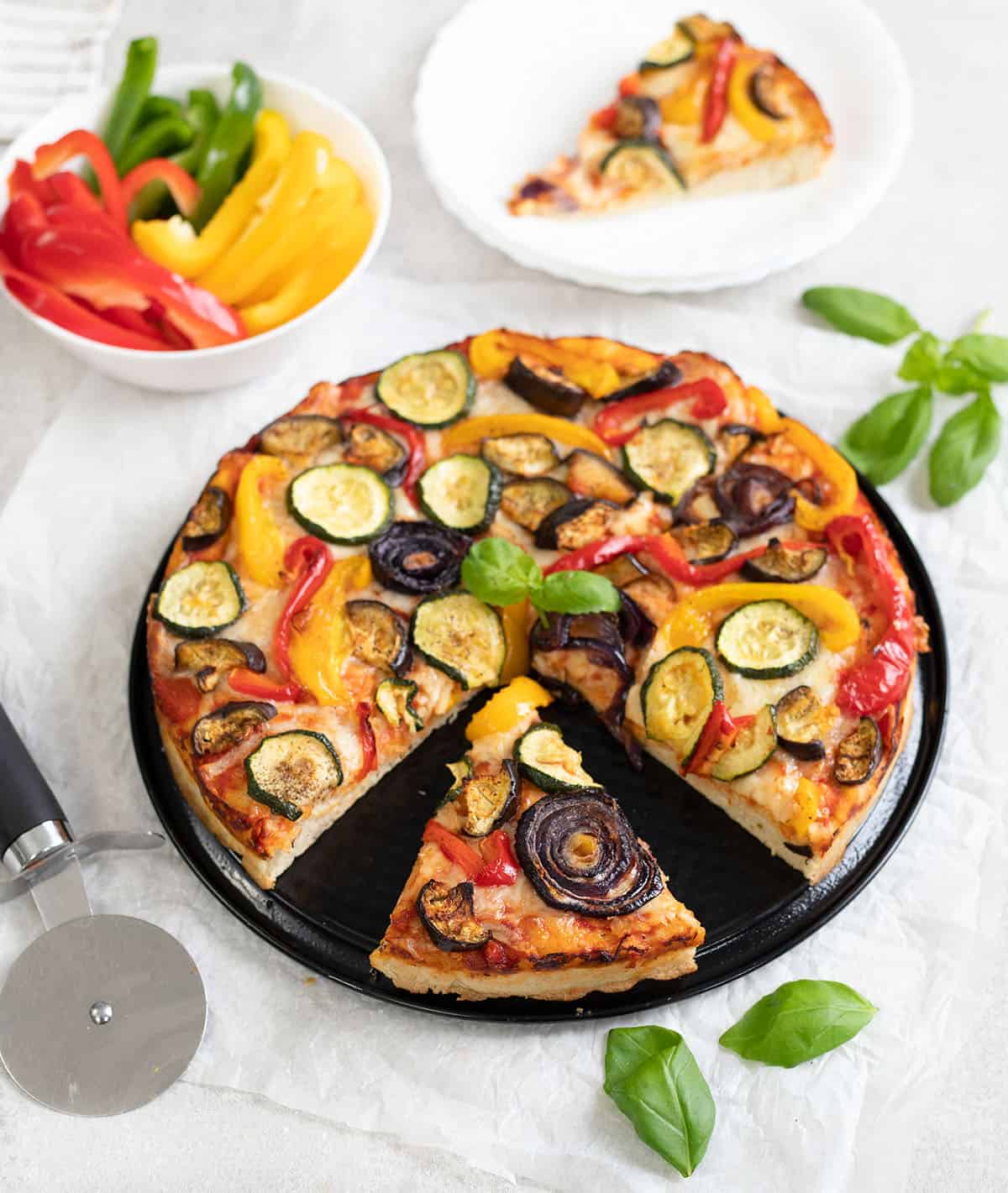 one slice of Roasted Vegetable Pizza.
