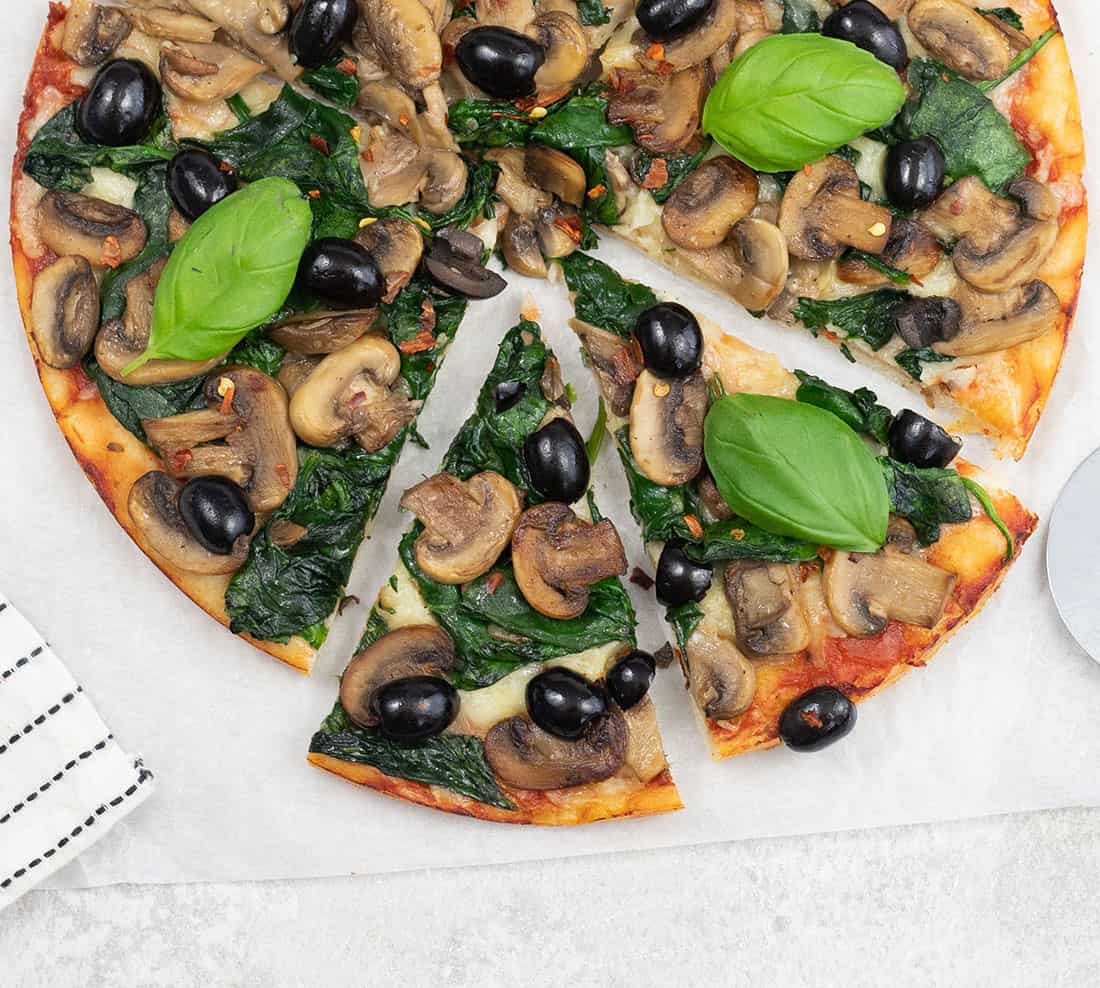 Fresh spinach and mushroom pizza.