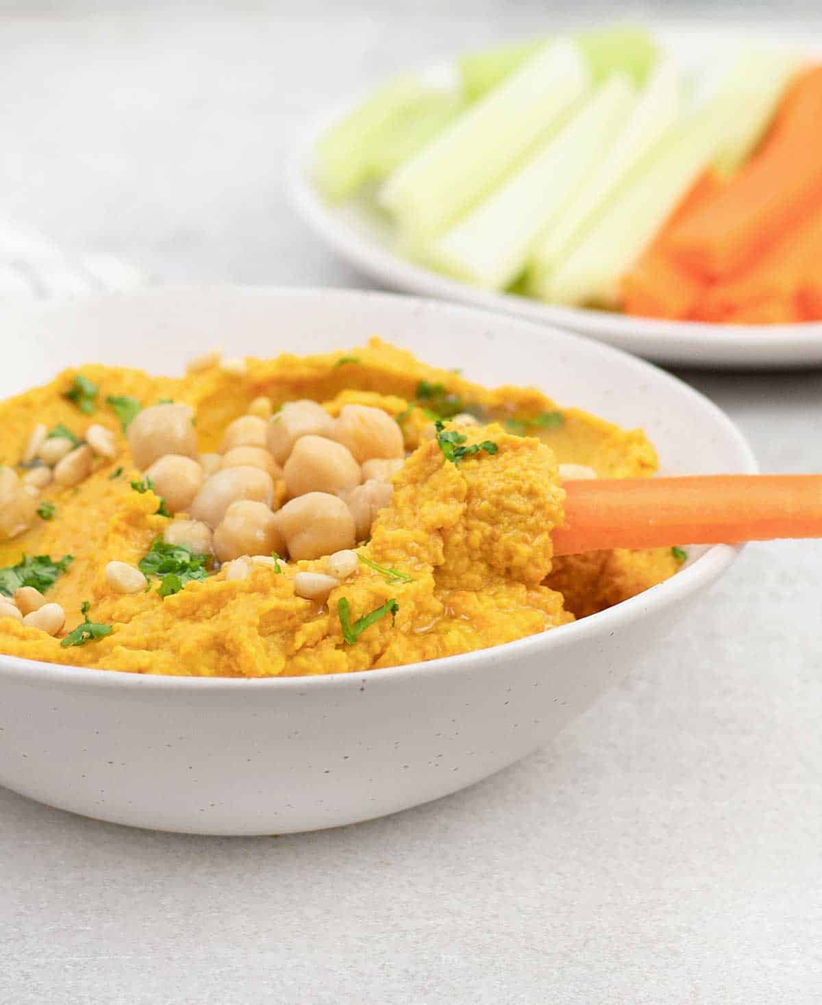 side shot to the roasted carrot Hummus bowl.