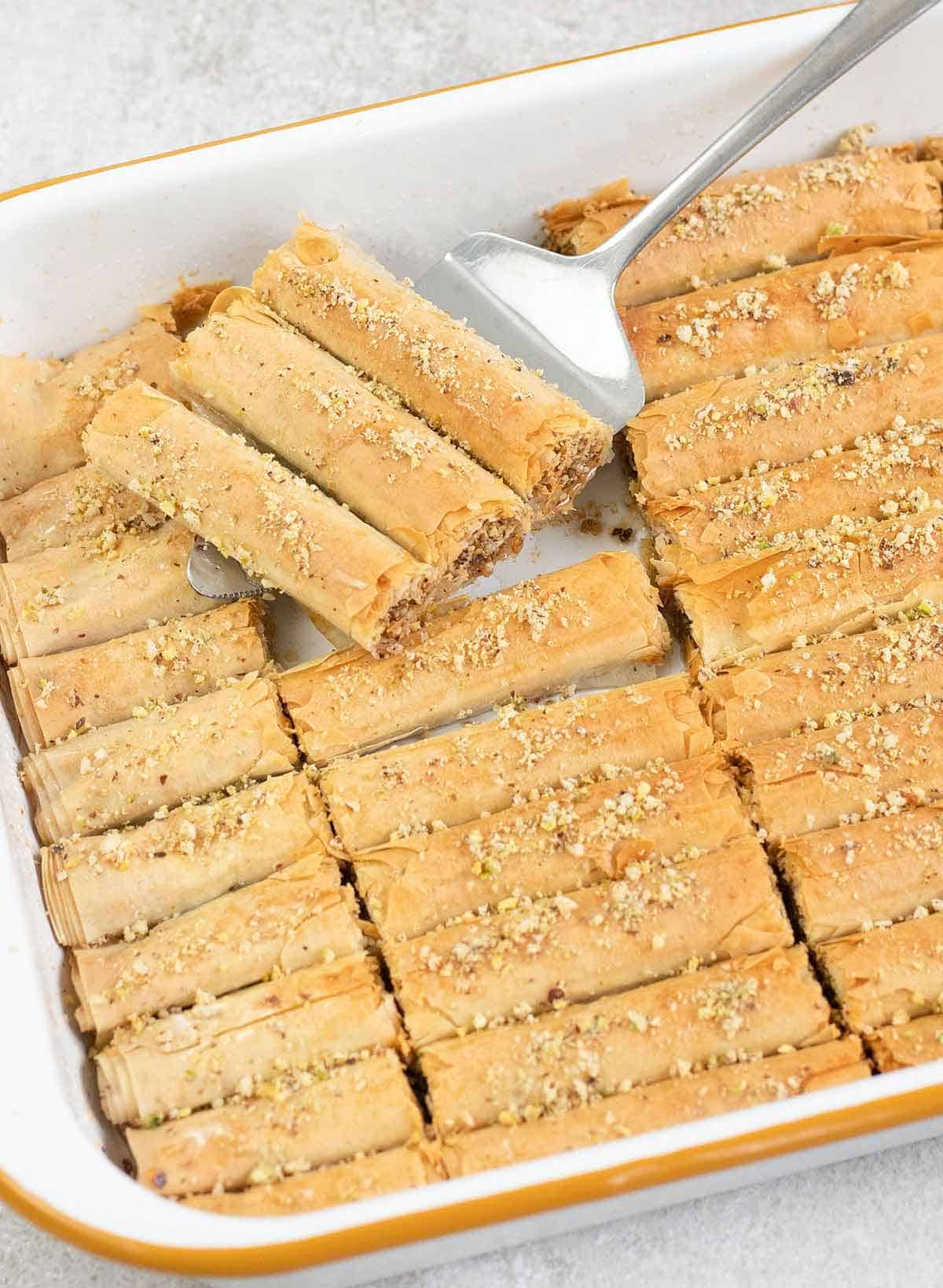 a baking pan full of Baklava Rolls