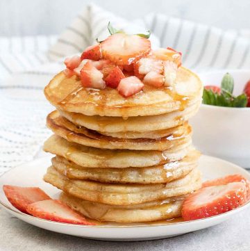 Oat Milk Pancakes and strawberries in a plate
