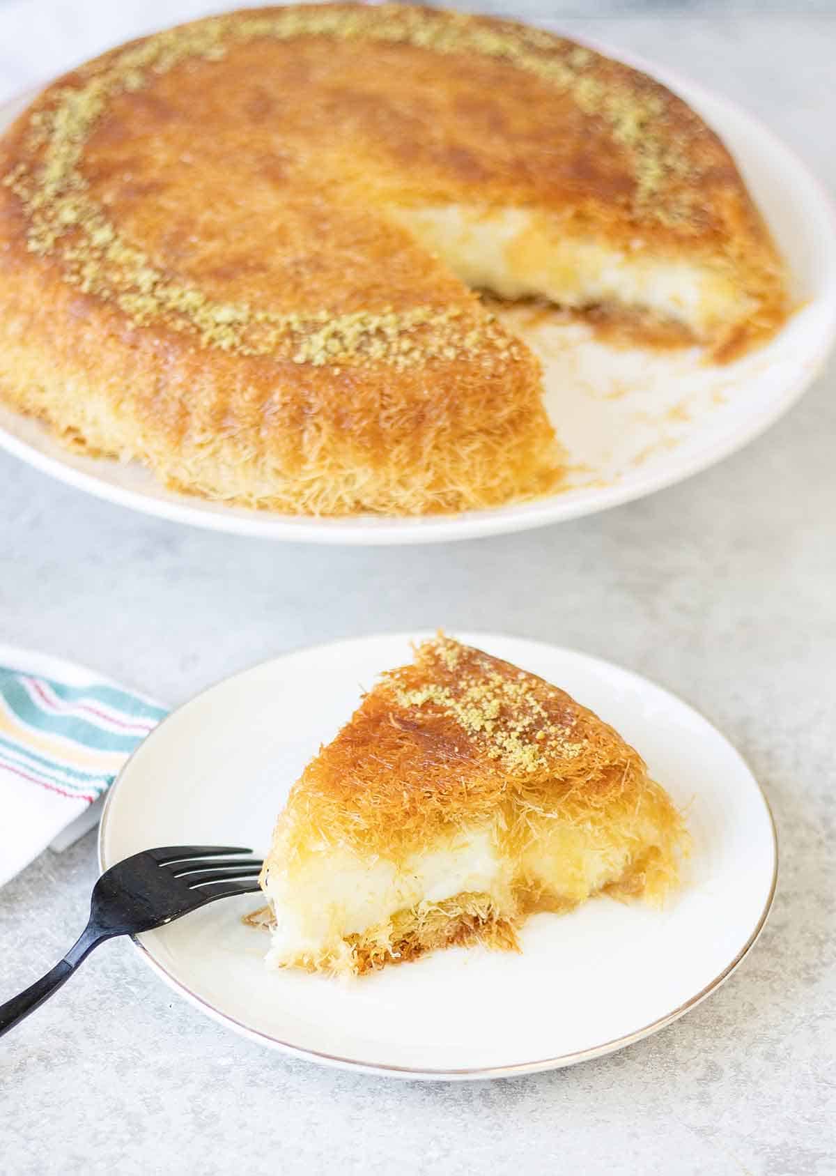 a piece of Kunafa in a plate