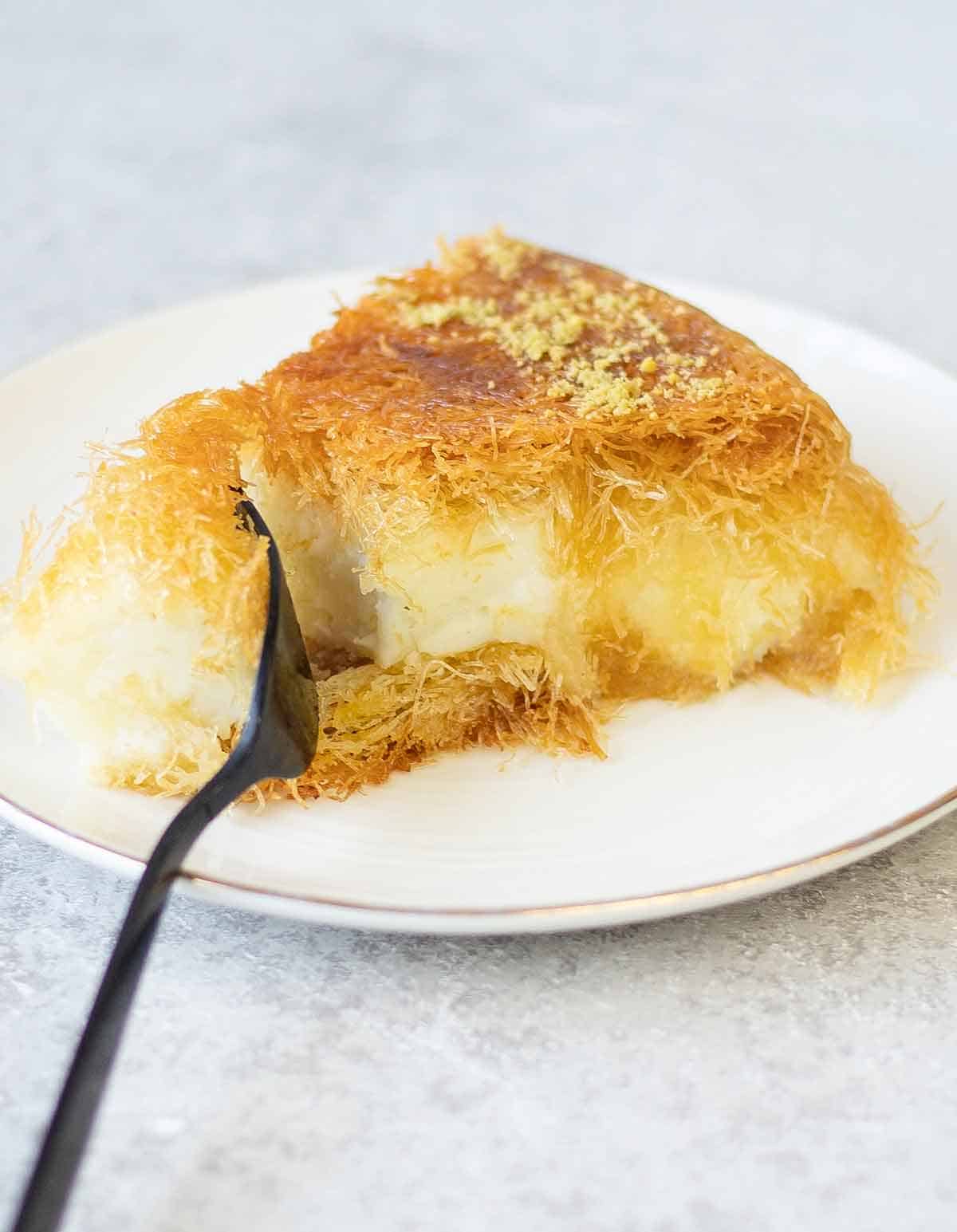 cut into piece  of Kunafa