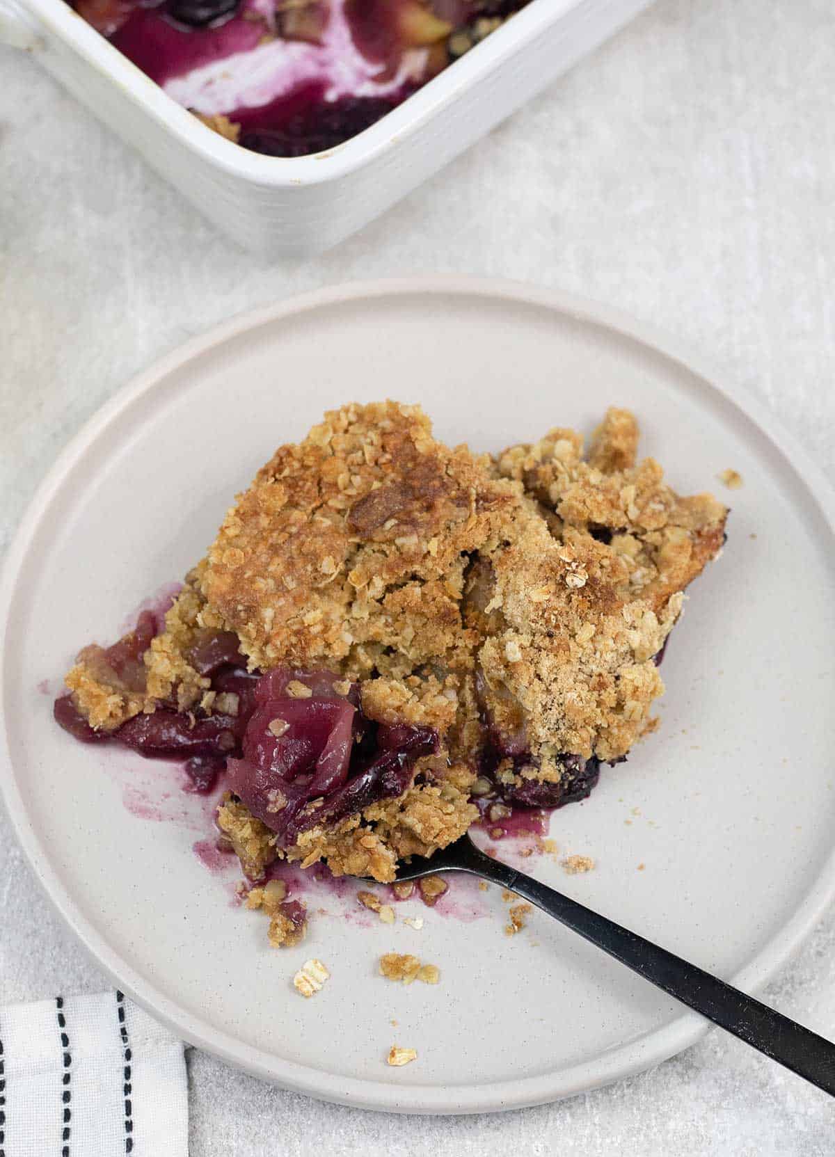 some of the Apple and Blueberry Crumble in a plate