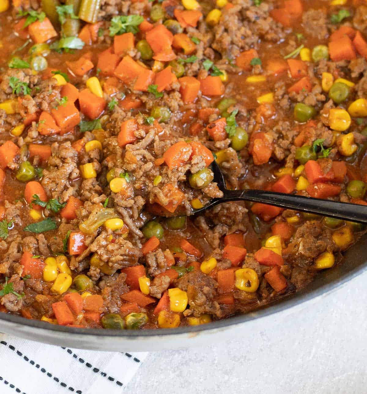 Savoury Mince with vegetables in a large skillet.