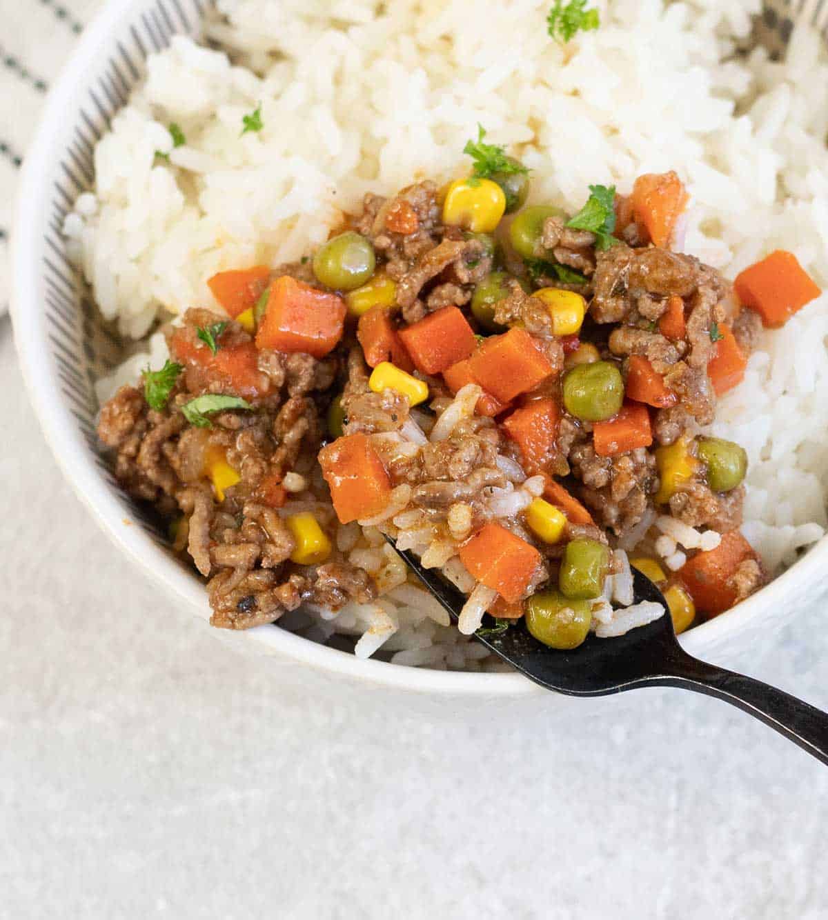 Savoury Mince with beef and veggies on top of rice