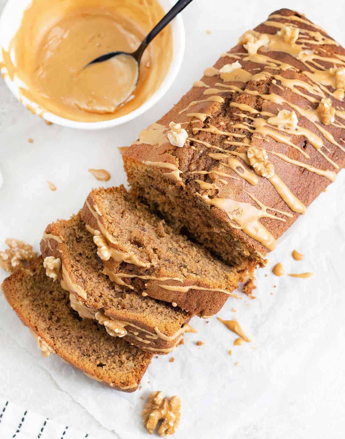 coffee and walnut loaf cake topped with  coffee glaze