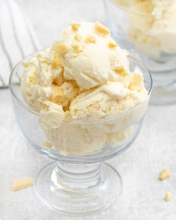 Close shot to no churn honeycomb ice cream topped with honeycomb chips.