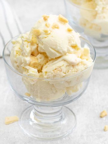 Close shot to no churn honeycomb ice cream topped with honeycomb chips.