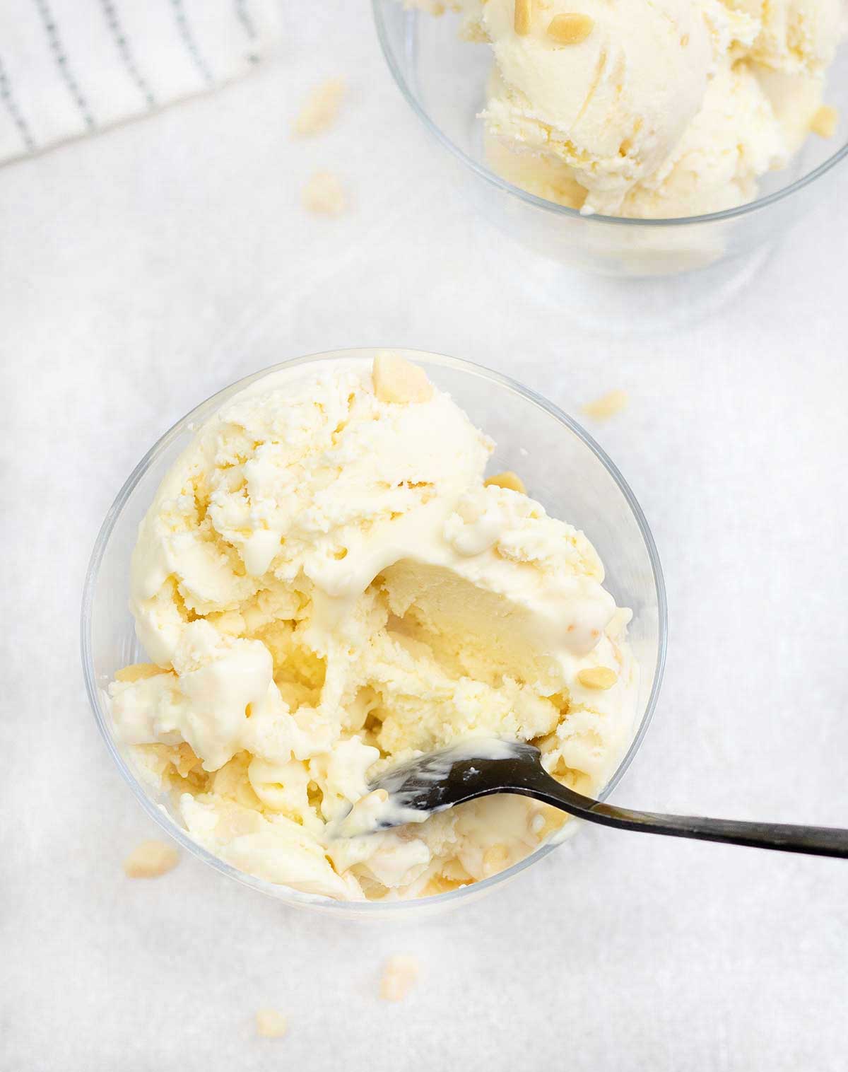 Eating honeycomb ice cream with a spoon.