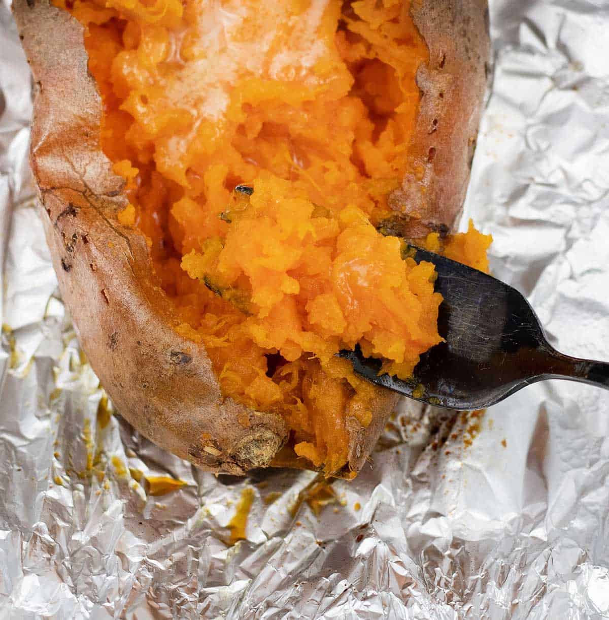 oven Baked Sweet Potatoes on top of Foil sheet