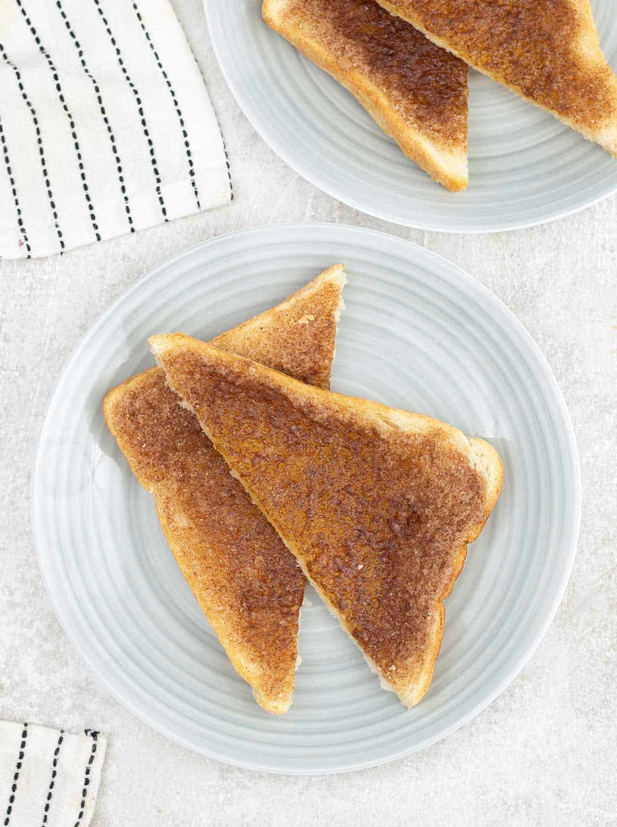 Cinnamon Toast cut into half into a plate