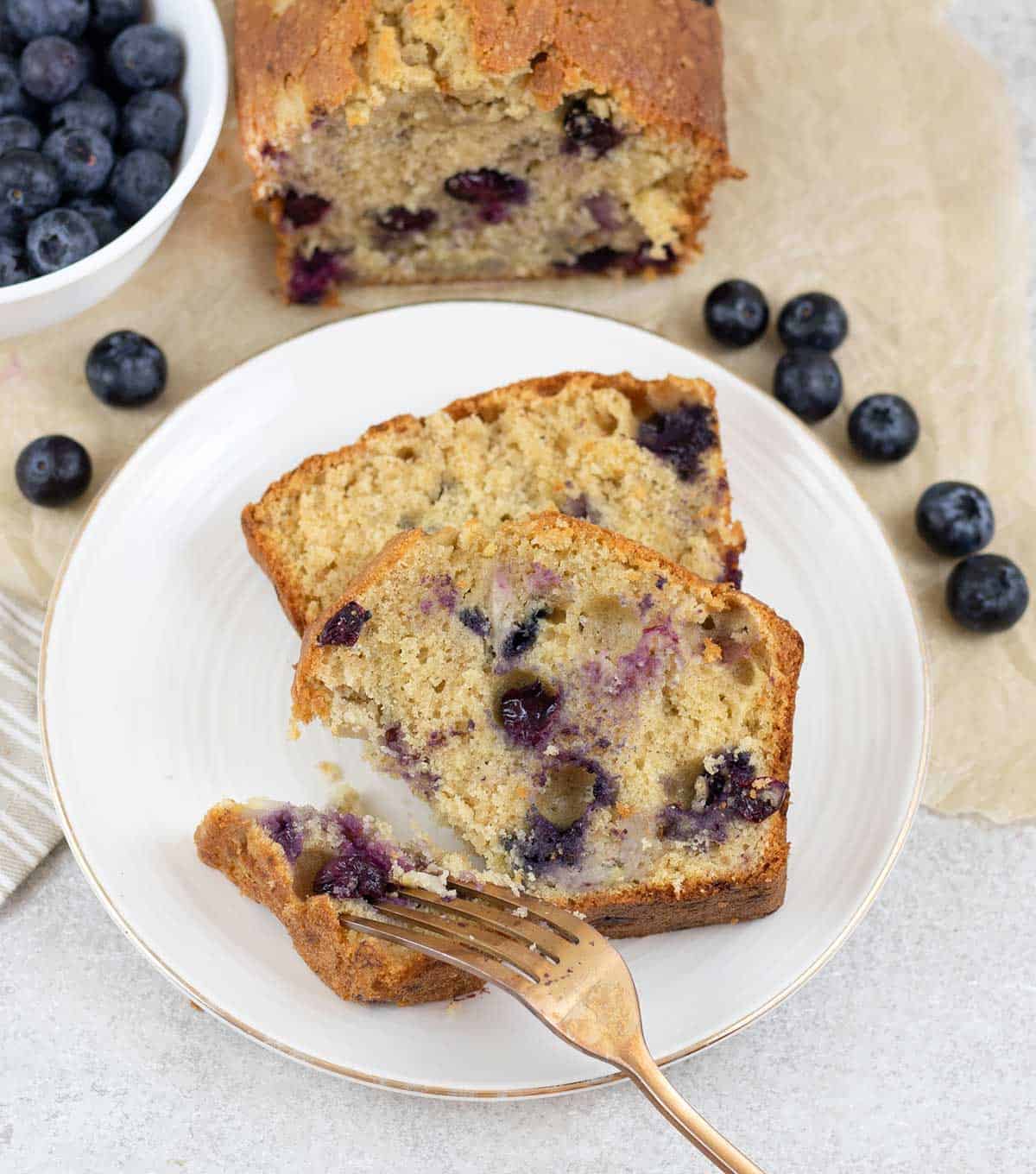 cut the Blueberry Banana Bread and some blueberries around it.