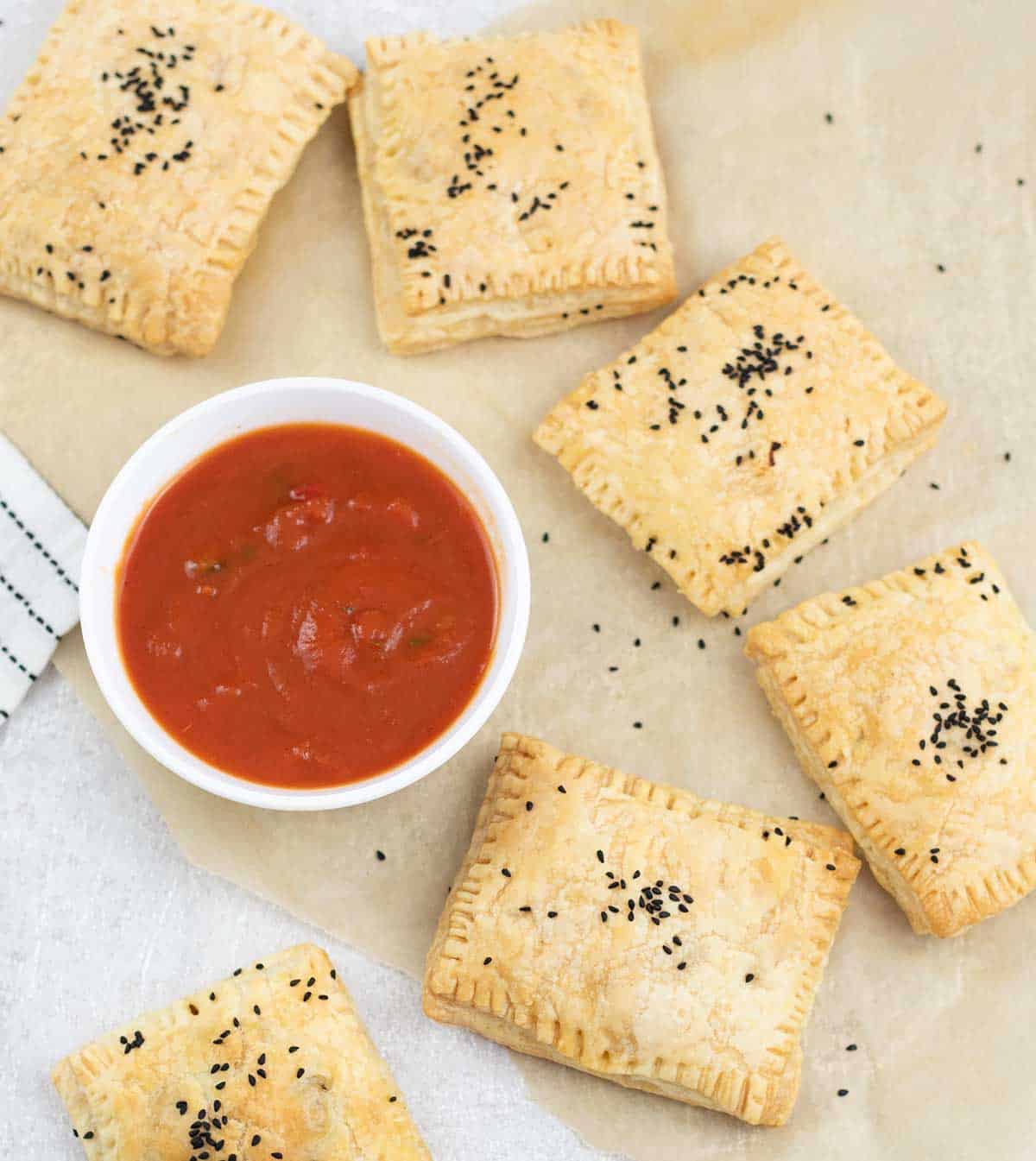 Chicken Puffs and a bowl of salsa.