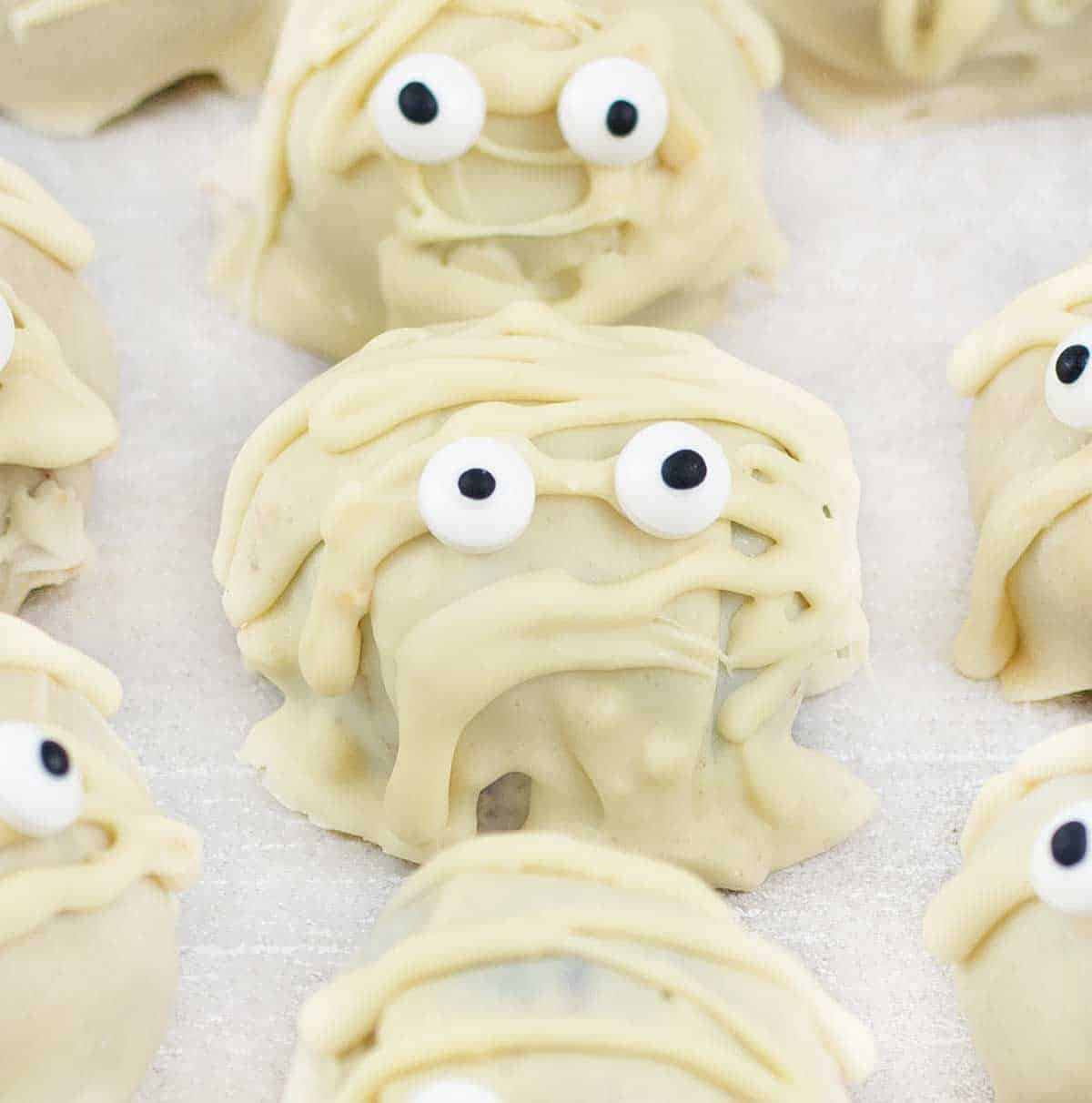 White Chocolate Mummy Truffles decorated for Halloween.