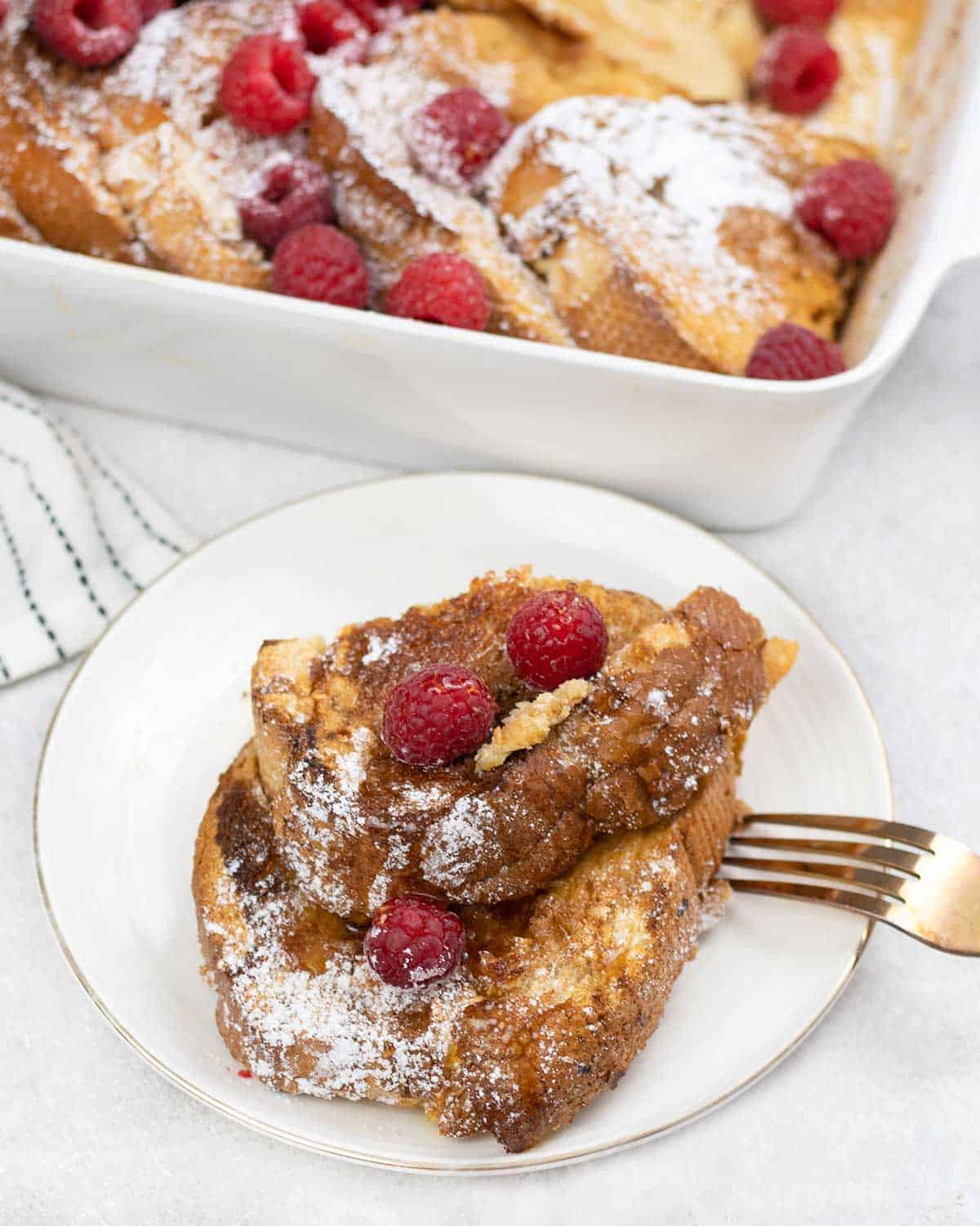 a plate full of Overnight French Toast Bake casserole