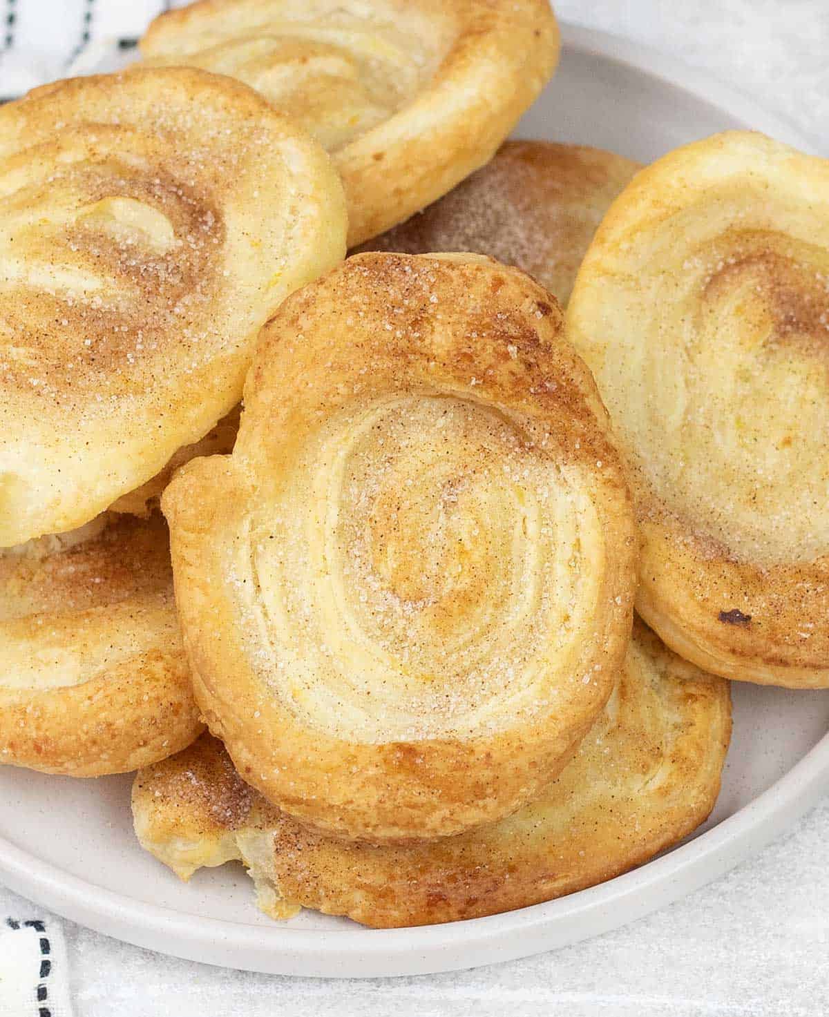 Arlettes biscuits topped with cinnamon sugar