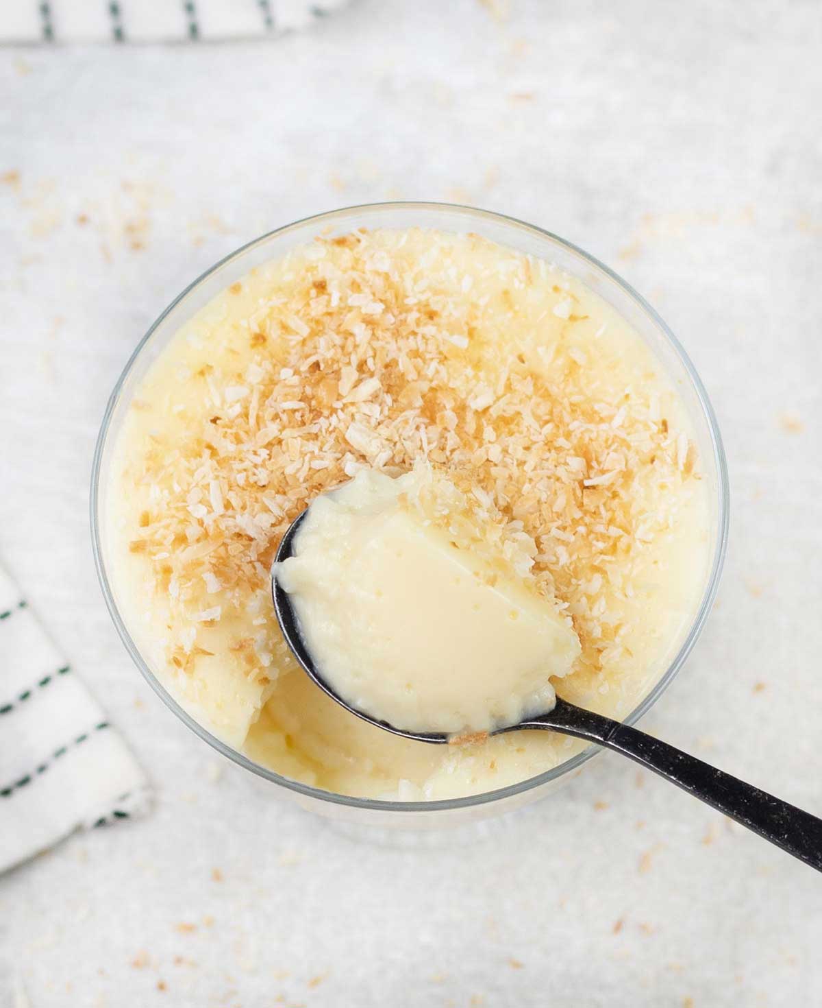 overheat shot of Coconut Milk Pudding in a glass.