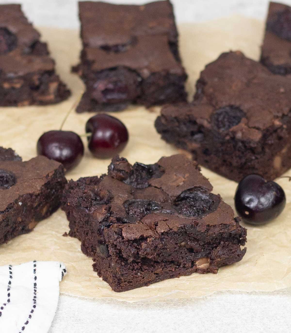 Cocoa cherry brownies and some cherries.
