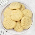 A plate is full of fork biscuits.