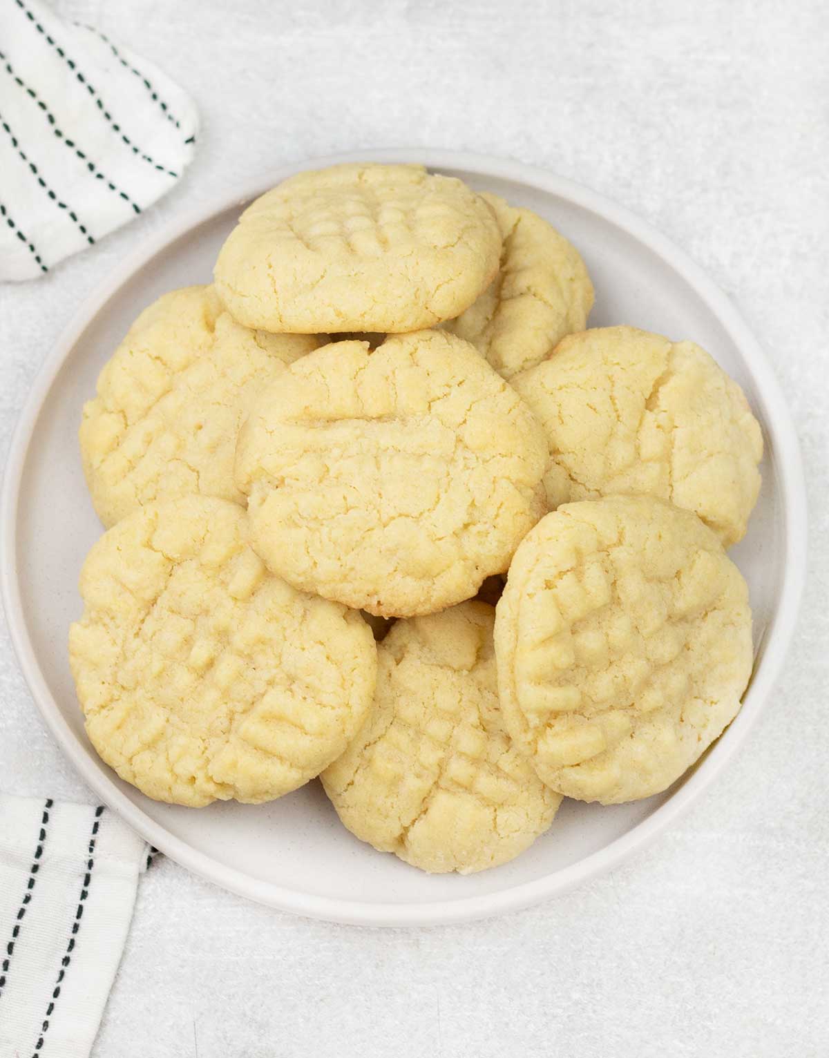 A plate is full of fork biscuits.