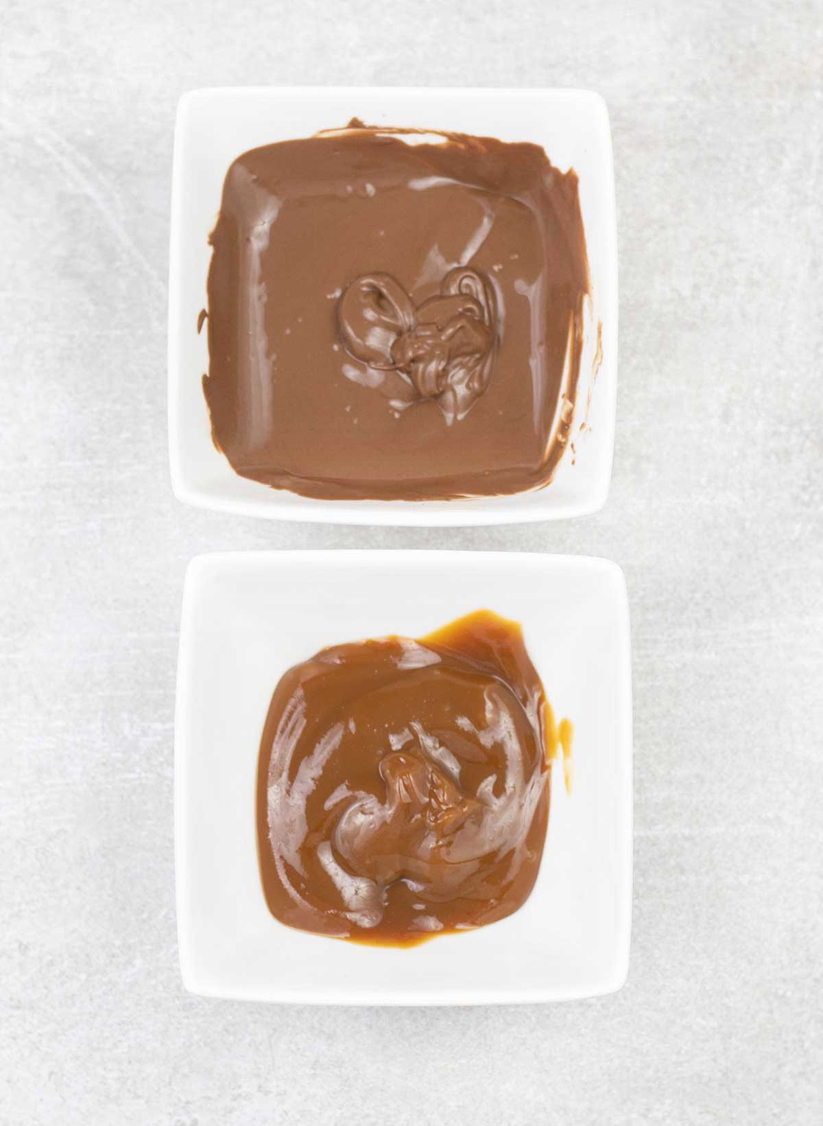 In 2 separate small bowls, microwave the caramels and chocolate chips.