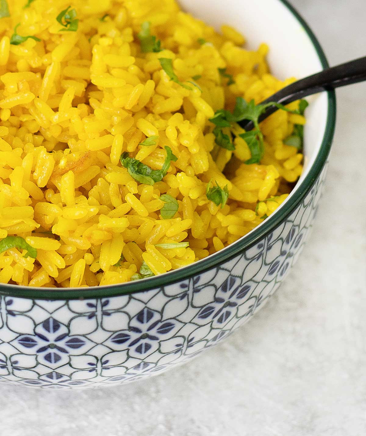 A spoonful of Turmeric rice.
