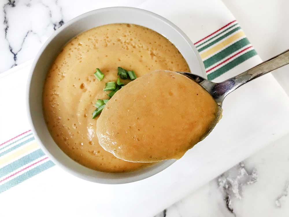 A spoonful of Egyptian red lentil soup.