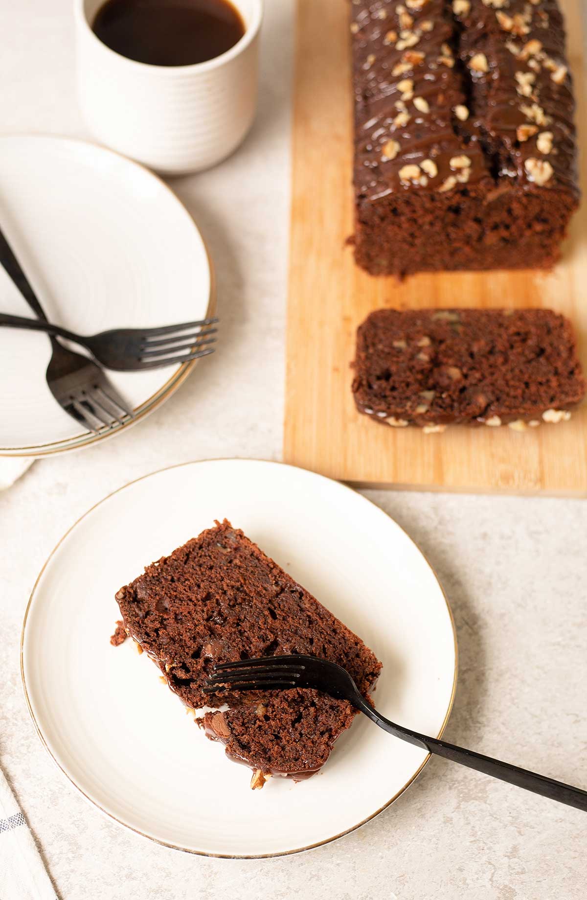 One slice of triple chocolate banana bread in a plate.