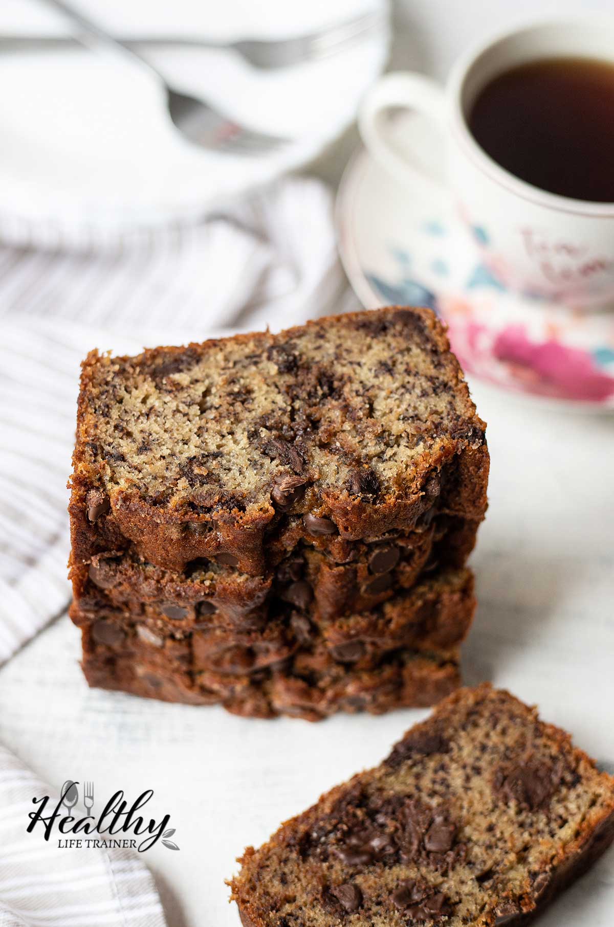 Chocolate chips banana bread slices on top of each others.