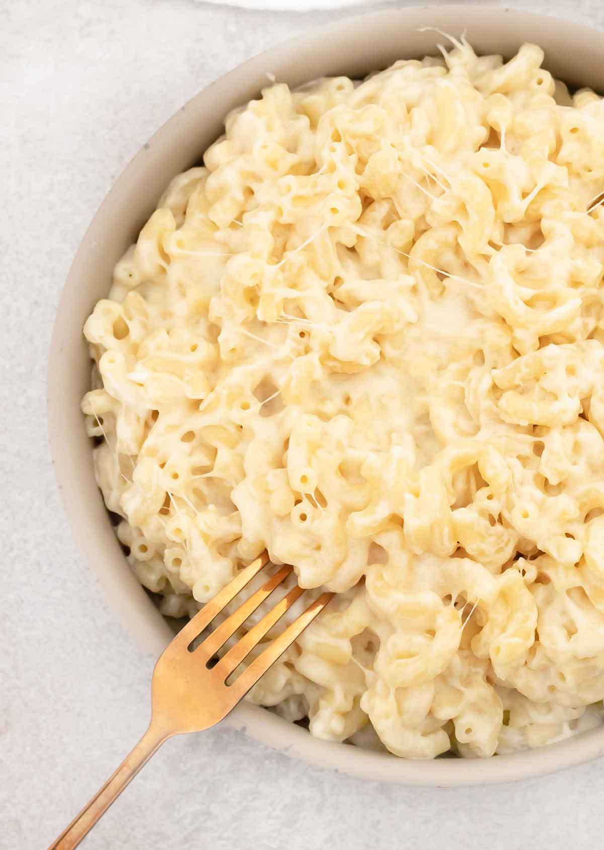 Greek yogurt mac and cheese in a serving bowl.