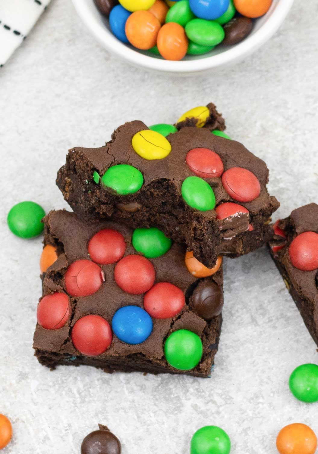 take a bite from M&M cookie bars.