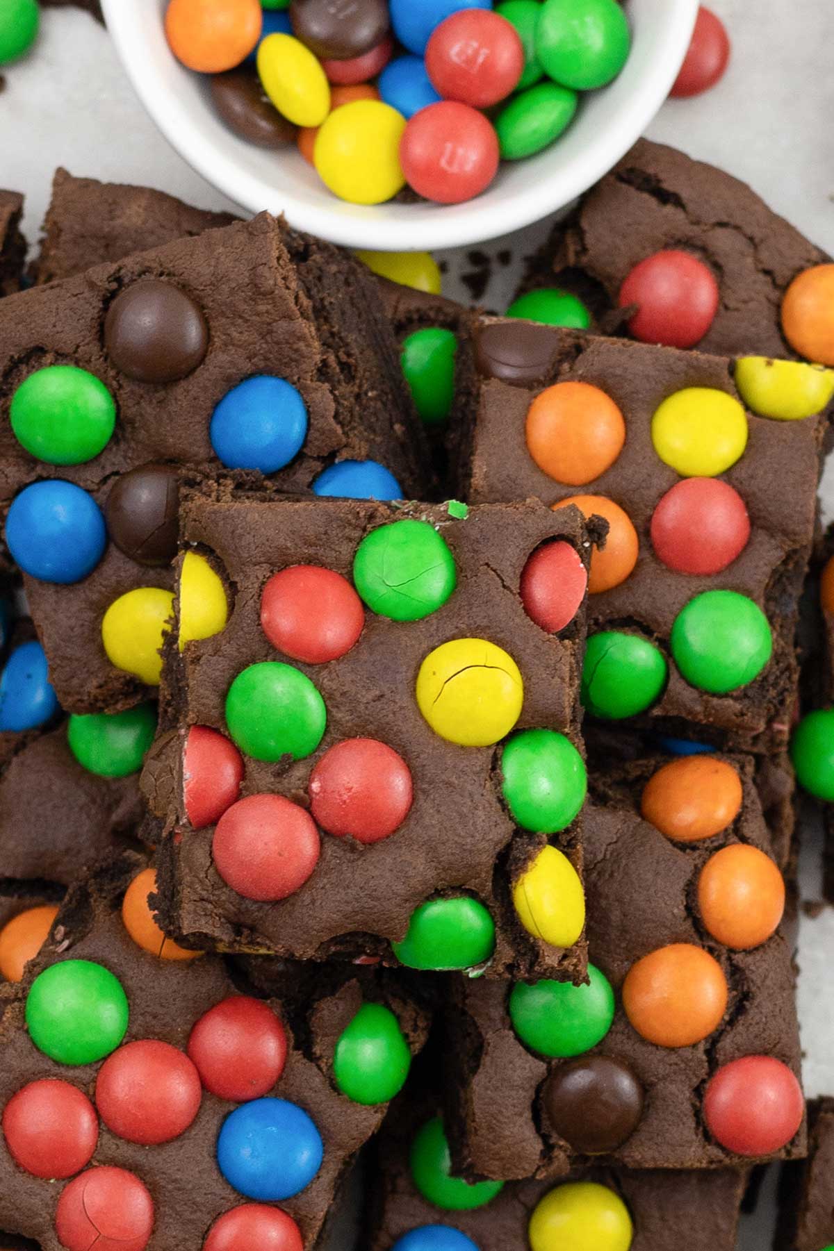 M&M cookie bars and a small bowl of M&M's.