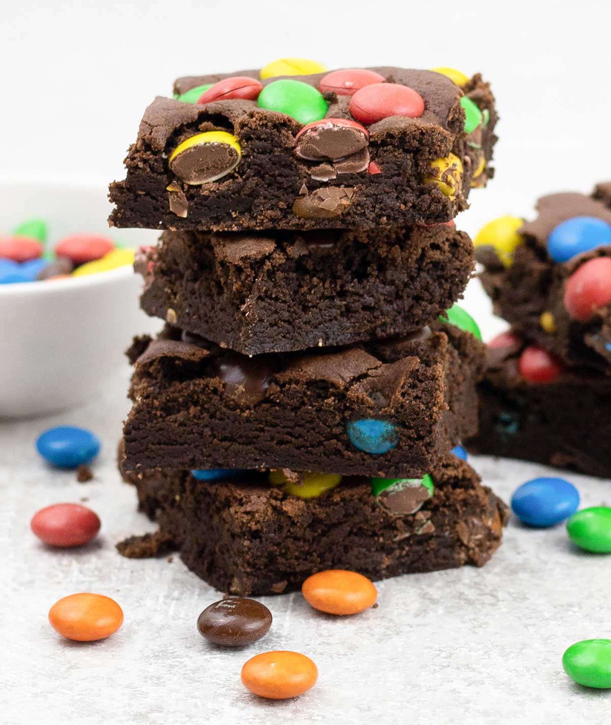 M&M cookie bars on top of each others.