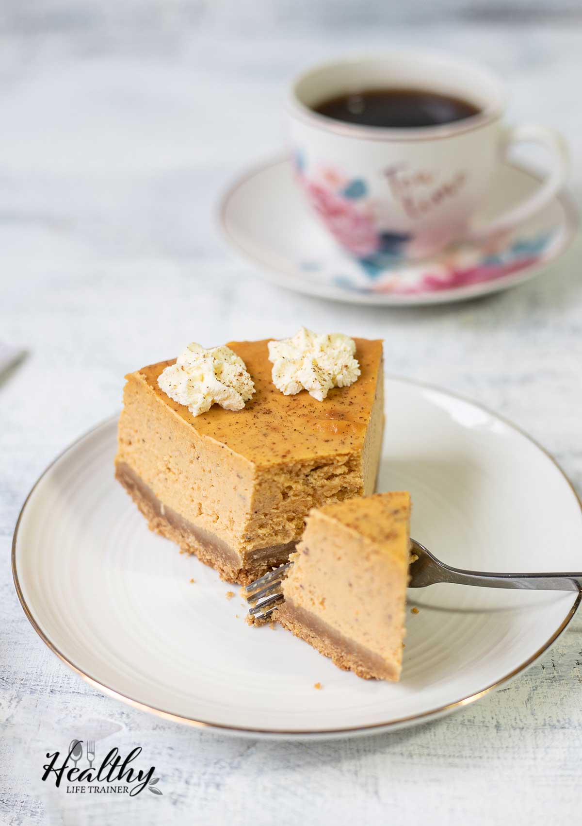 Cut Philadelphia pumpkin cheesecake slice.